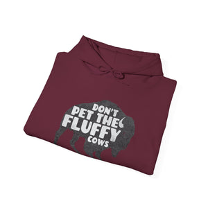 Don't pet the fluffy cows Hooded Sweatshirt