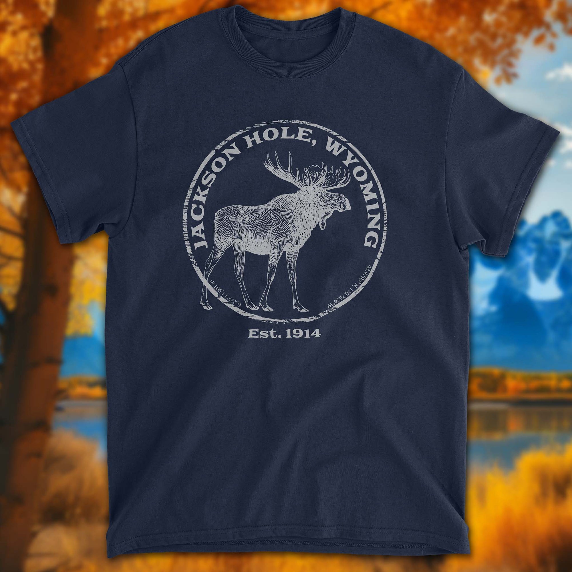 Jackson Hole Moose T-Shirt in front of golden aspens and mountains